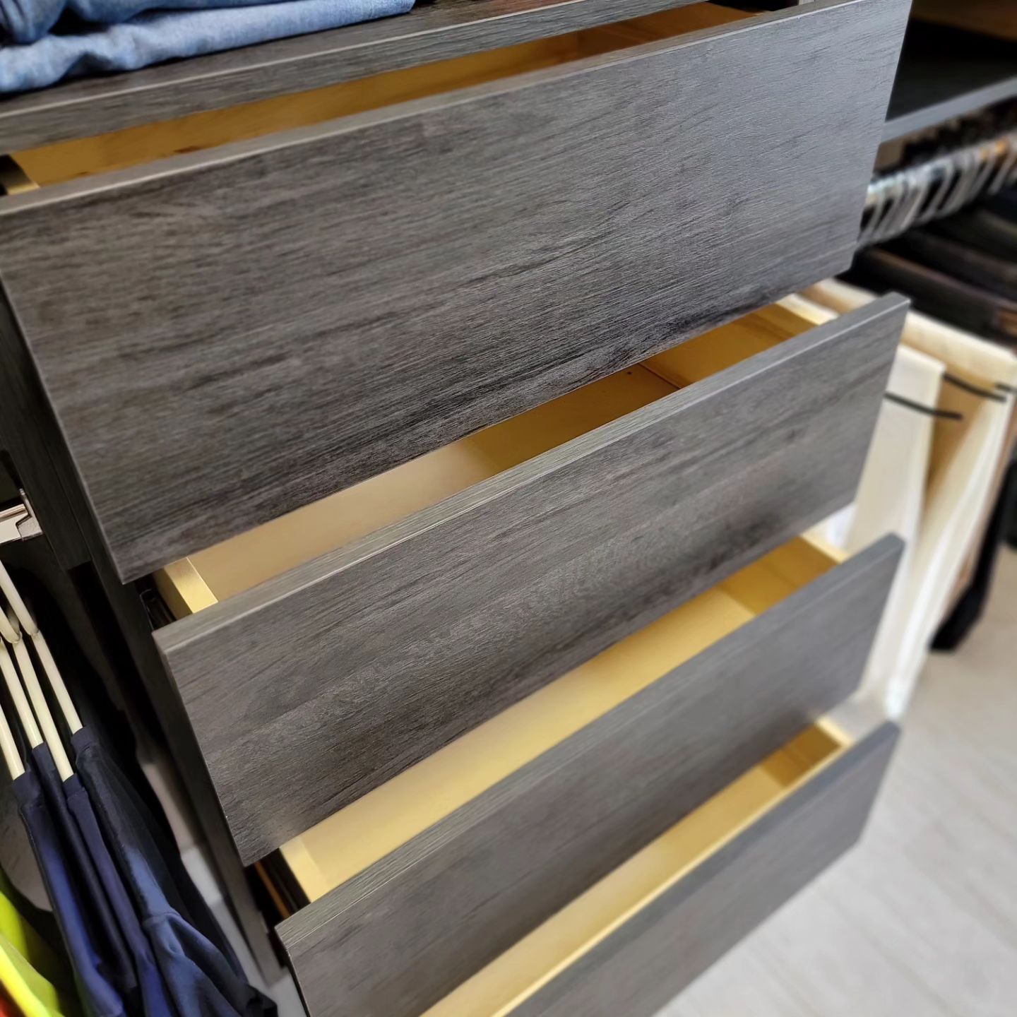 Soft-close drawer detail in gray finish