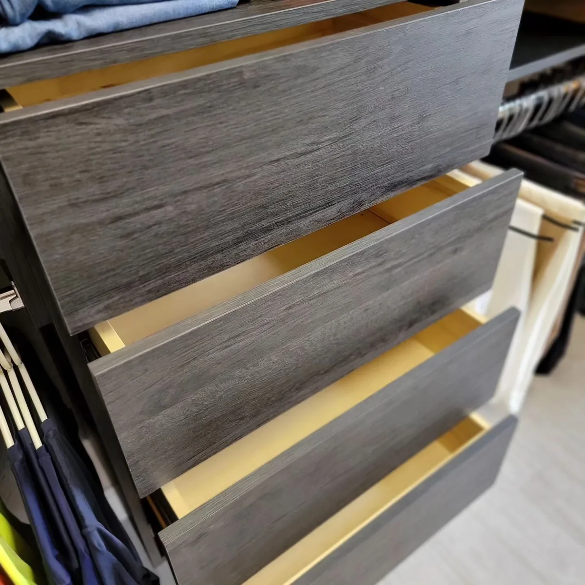 Soft-close drawer detail in gray finish