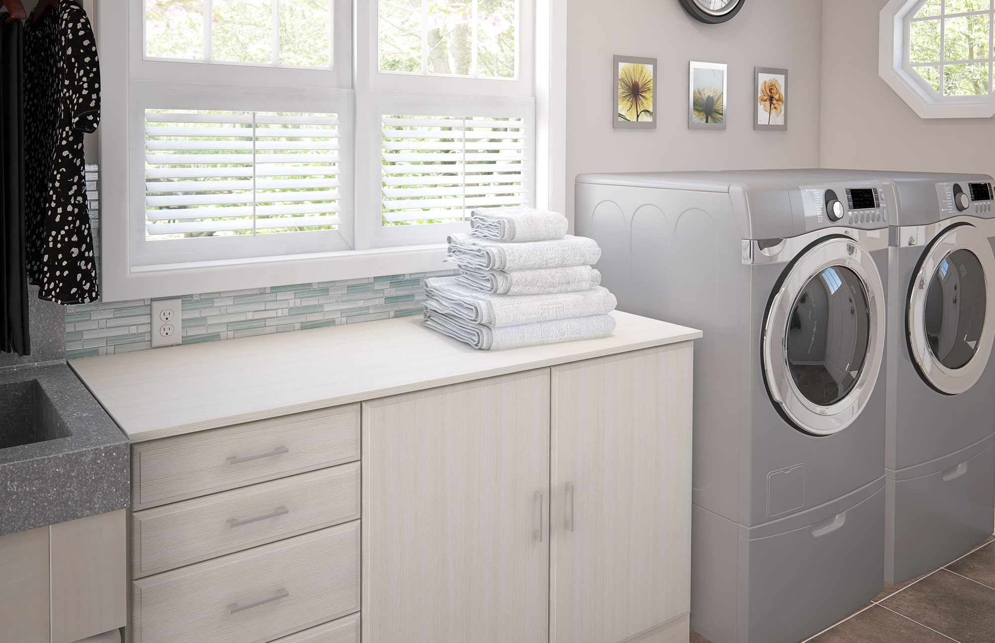 Custom laundry room with folding counter and cabinets