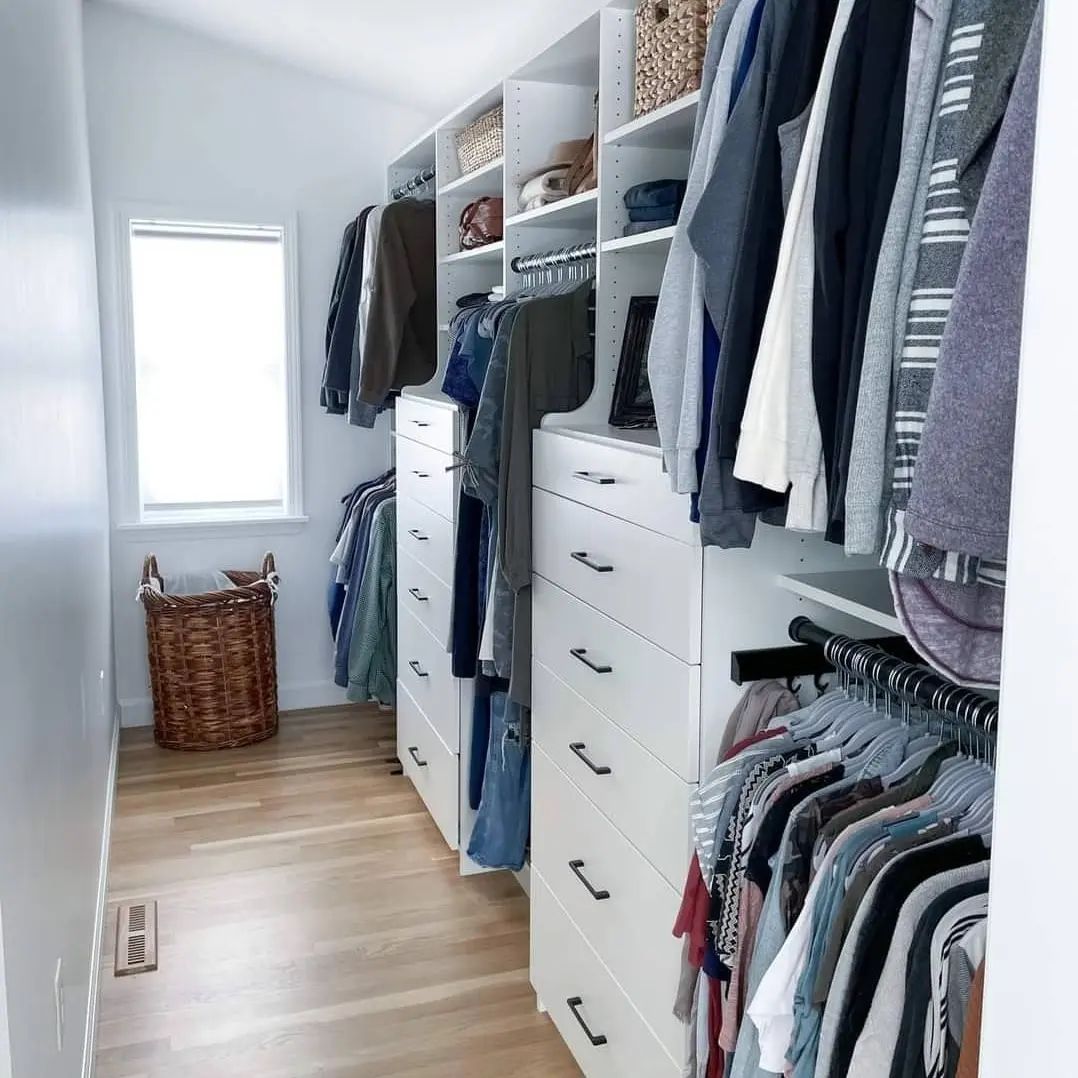 Custom walk-in closet with drawers and hanging space in Auburn AL