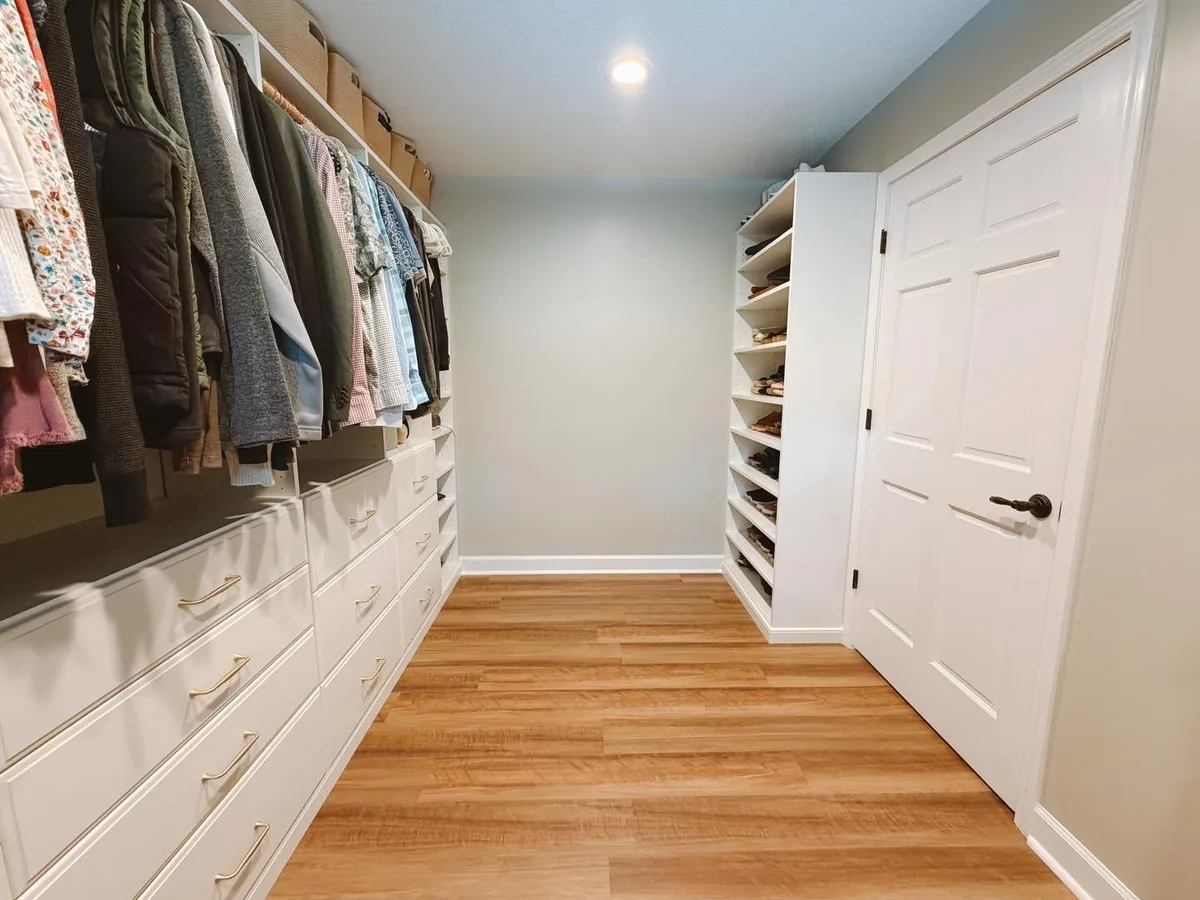 Walk-in closet with shoe tower and drawers